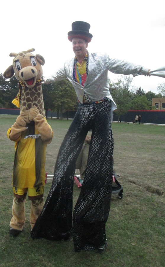 Jenny the Giraffe with circus performer